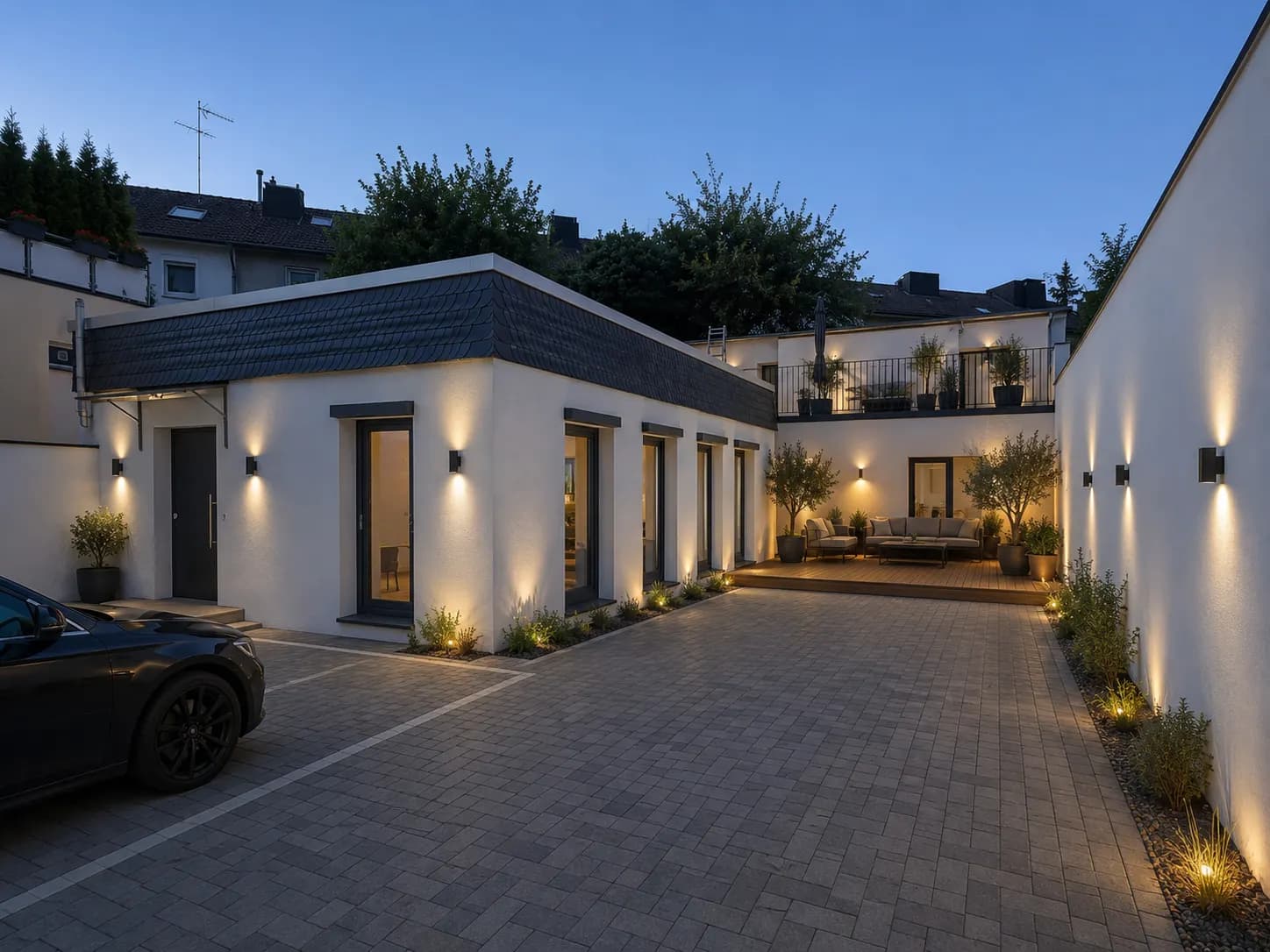 Beleuchteter Innenhof bei Nacht, Hof-Loft Rüttenscheid